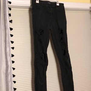 Kendall and Kylie black ripped high waisted jeans